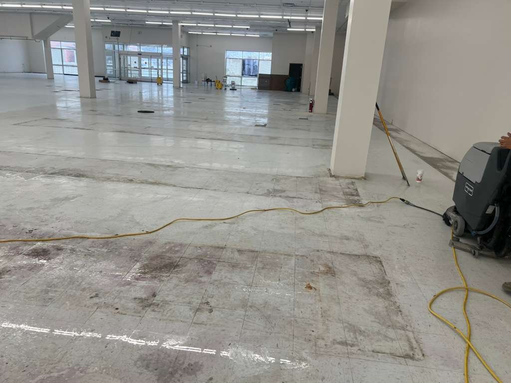 Commercial floor before stripping and waxing in Baltimore — dull and stained