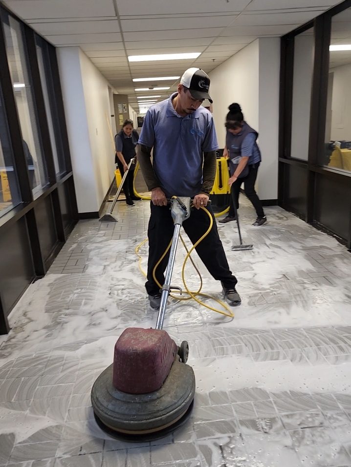 Levdok crew stripping a commercial floor before waxing in Baltimore