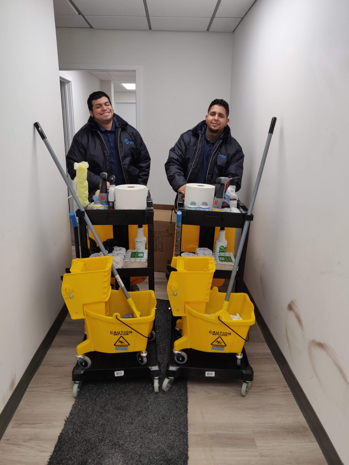 Levdok janitorial crew with fully stocked carts at a Baltimore office
